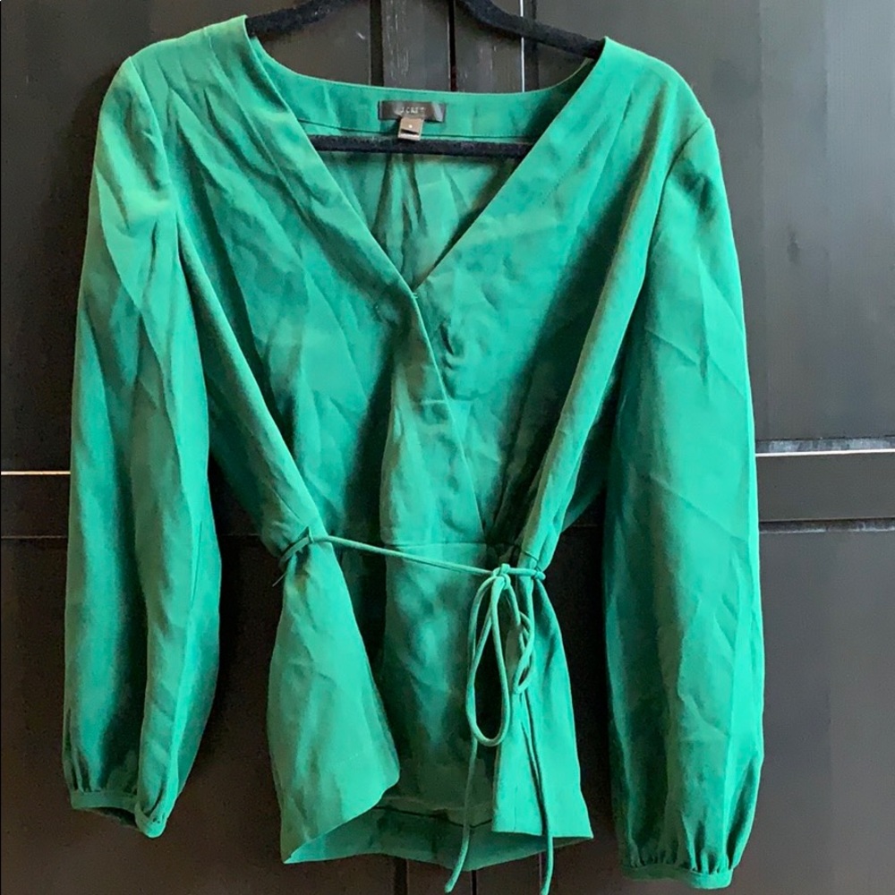 Peplum wrap blouse.